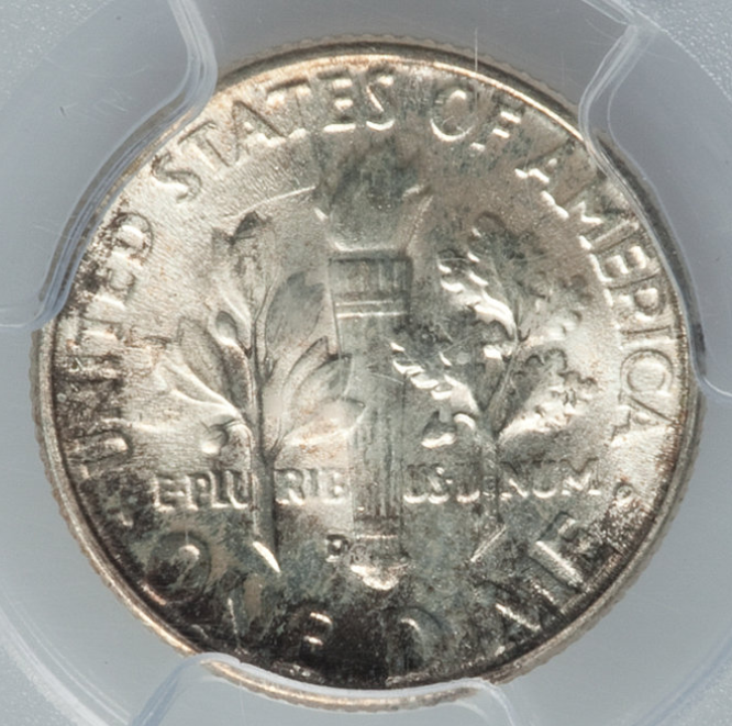 1958 Roosevelt dime doubled die error showing doubling on date and lettering under magnification